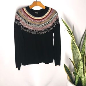 Black sweater w/colorful collar detailing. Size M.
